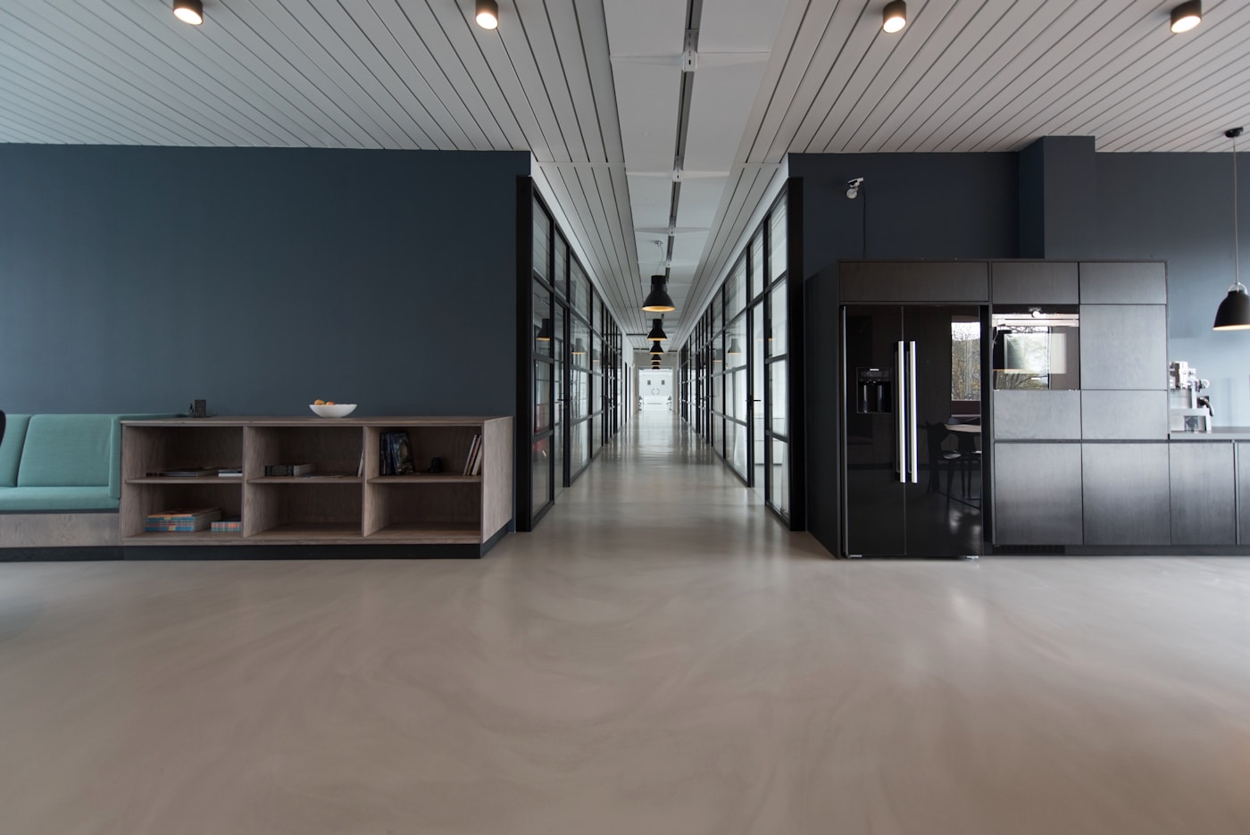 Open office workspace with desks and plants